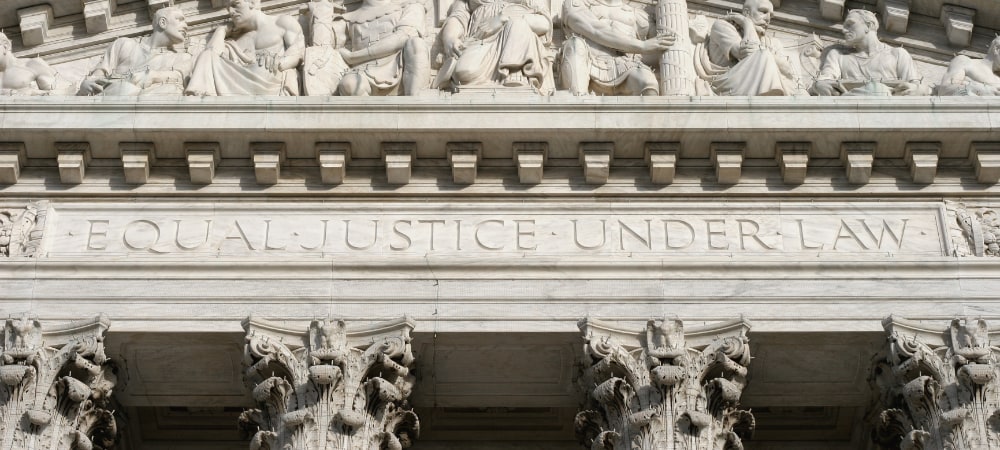 courthouse building with text saying "equal justice under law"